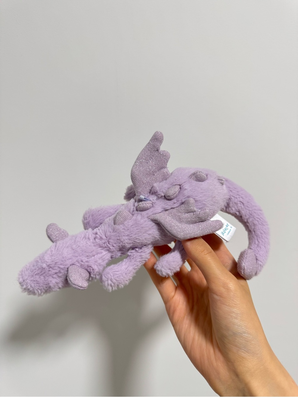 Jellycat lavender dragon bag charm missing metal part